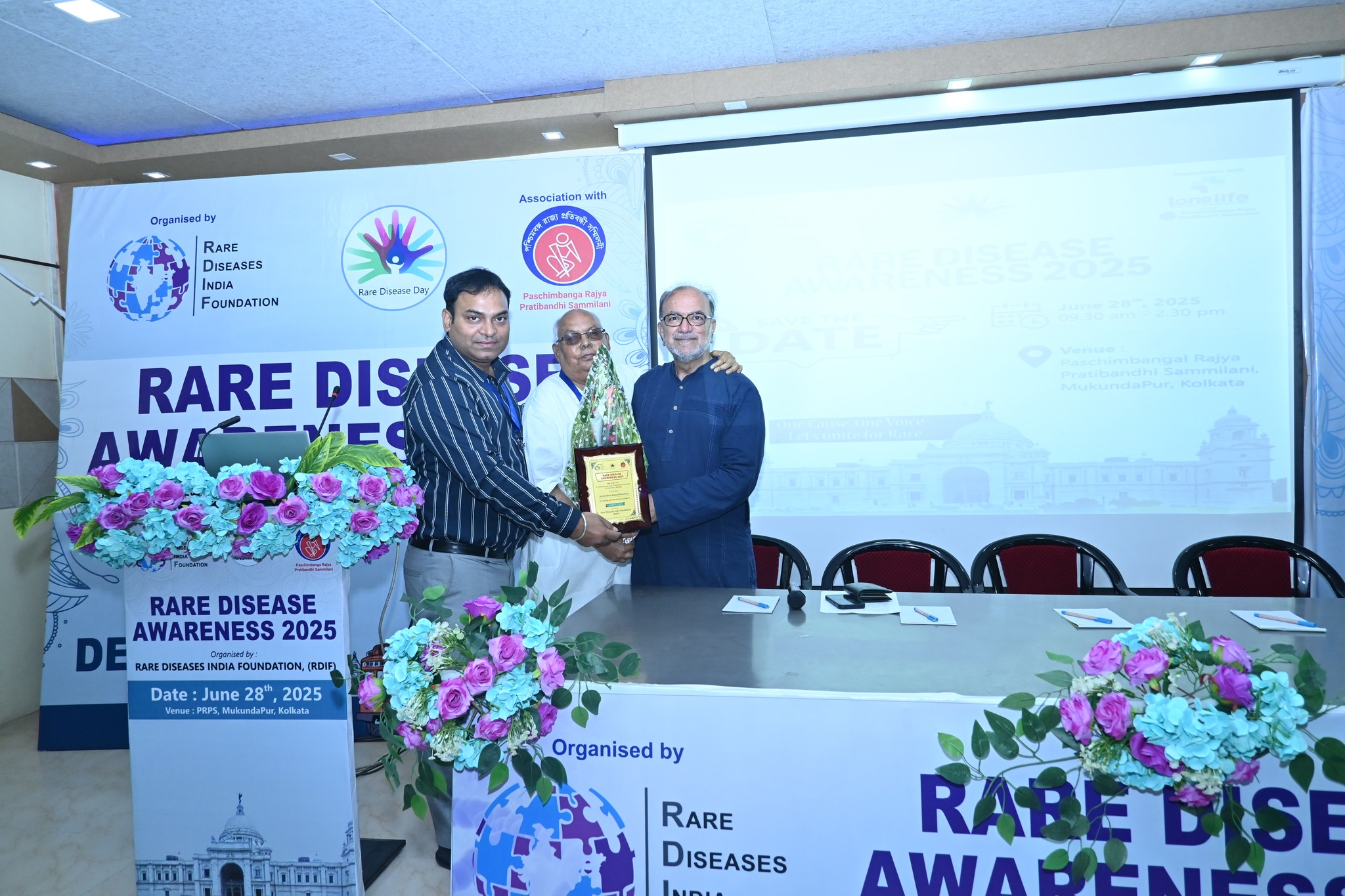 Close-up of informational brochures and materials for the event.